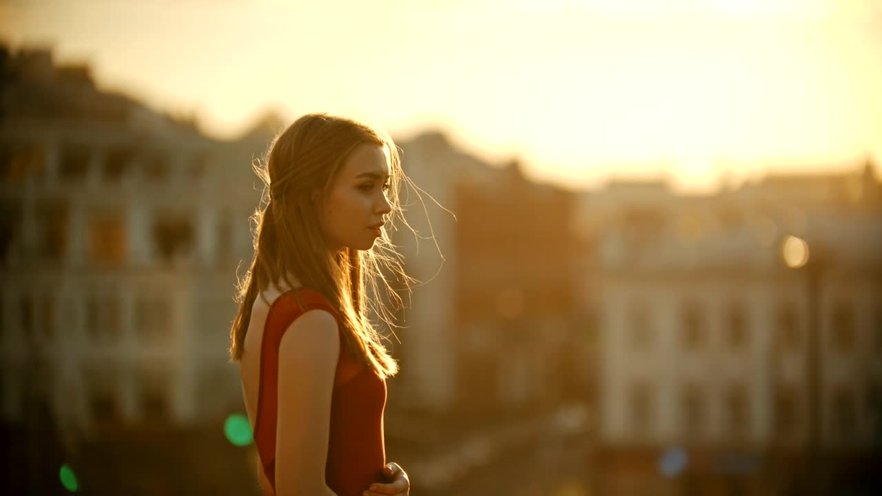 Download Stock Video Girl Under Sunlight On Top Of A Building Live Wallpaper For PC