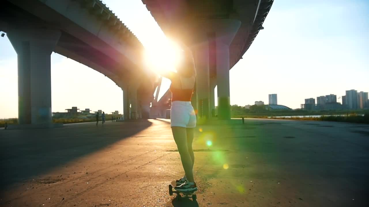 Download Stock Video Girl Skating In The Afternoon Under A Bridge Live Wallpaper For PC