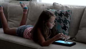 Download Stock Video Girl Relaxing With A Tablet Game Live Wallpaper For PC