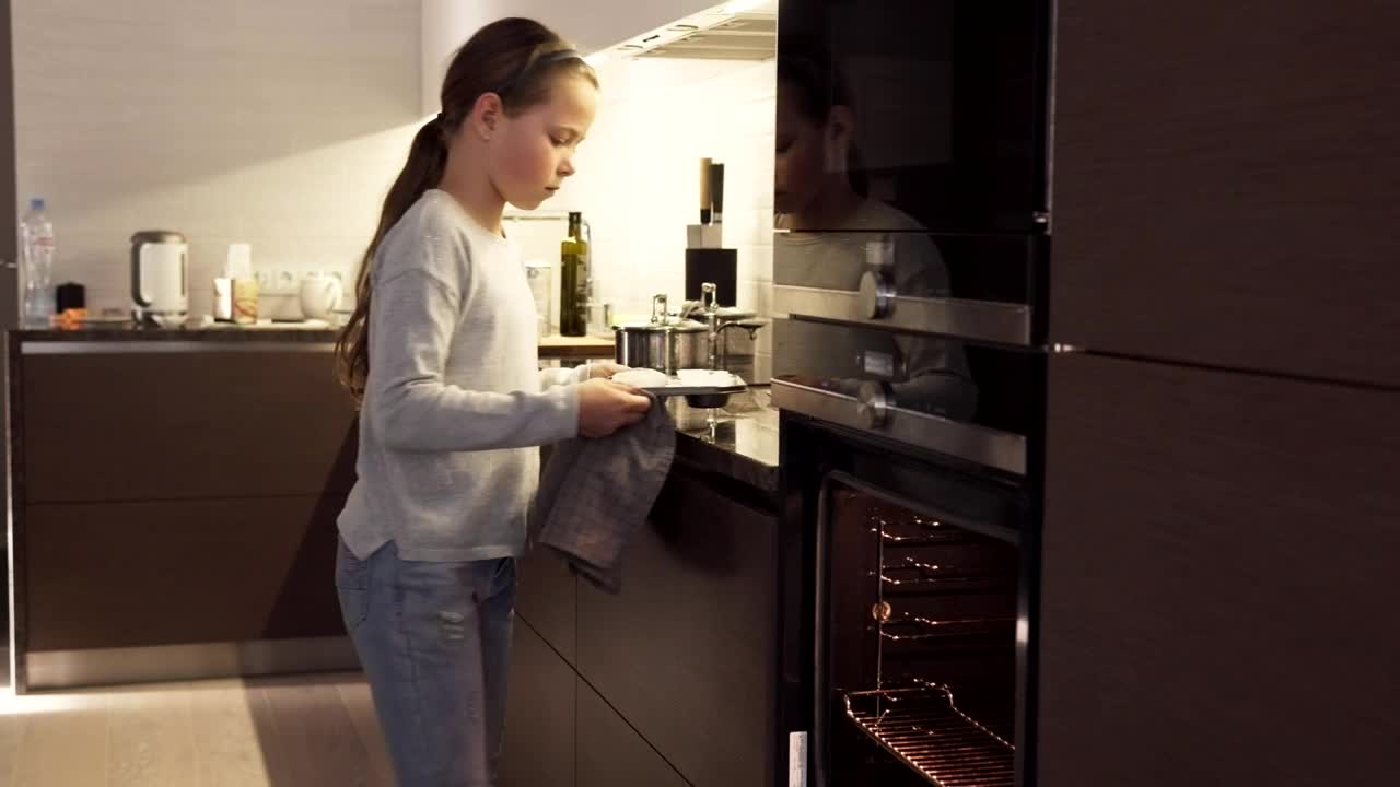 Download Stock Video Girl Putting Cookies In An Oven Live Wallpaper For PC