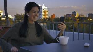Download Stock Video Girl On A Terrace Having A Video Call Live Wallpaper For PC