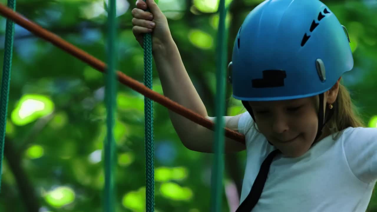 Download Stock Video Girl In An A Rope Adventure In A Park Live Wallpaper For PC