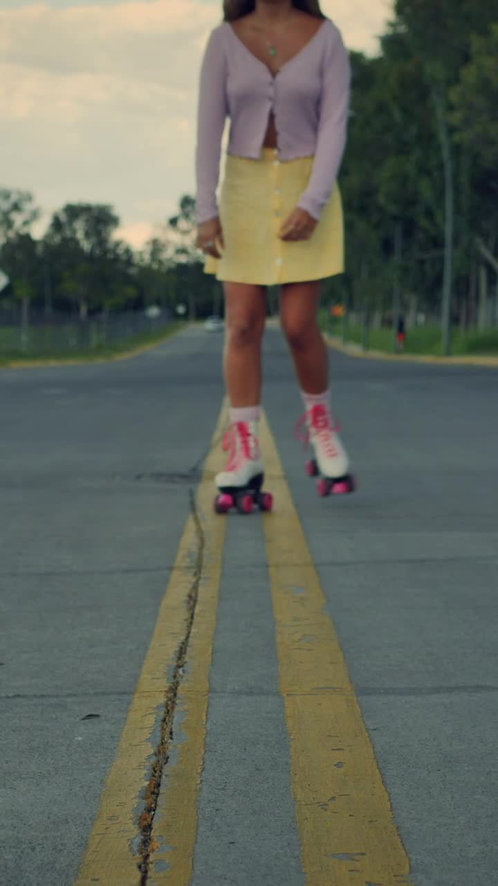 Download Stock Video Girl Approaching Skating Down The Middle Of The Street Live Wallpaper For PC