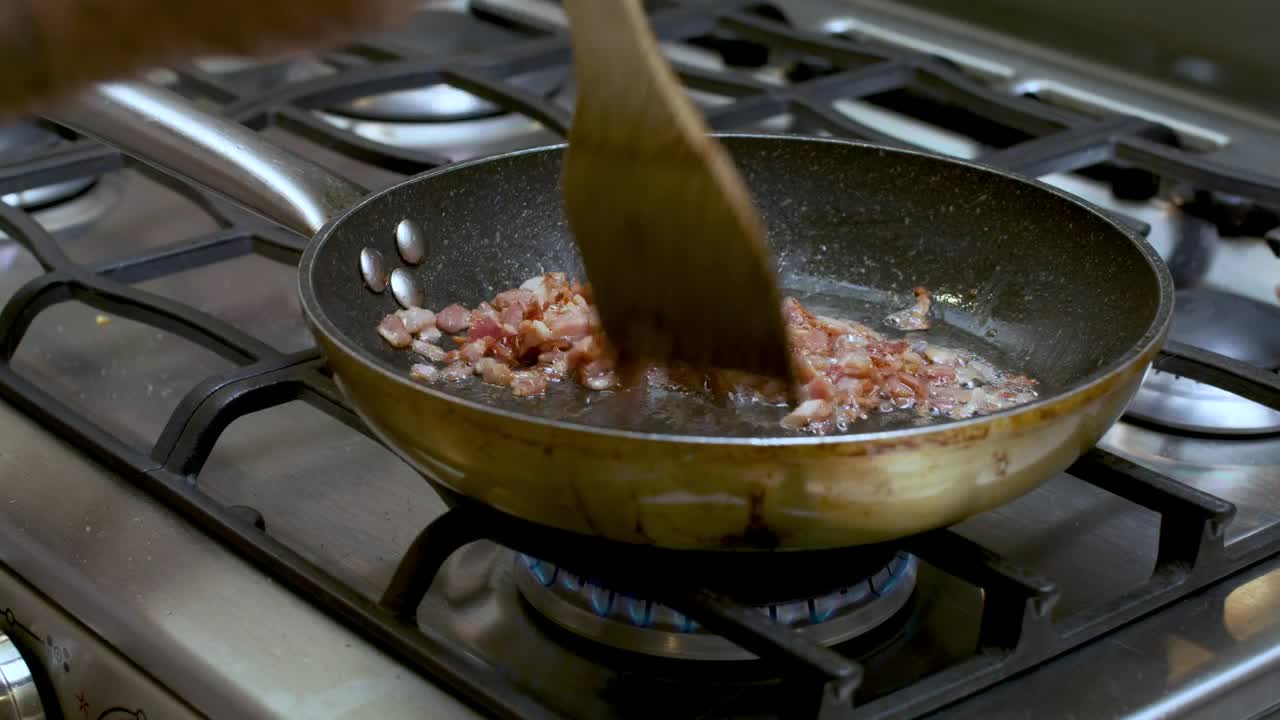 Download Stock Video Frying Diced Bacon In A Skillet Live Wallpaper For PC