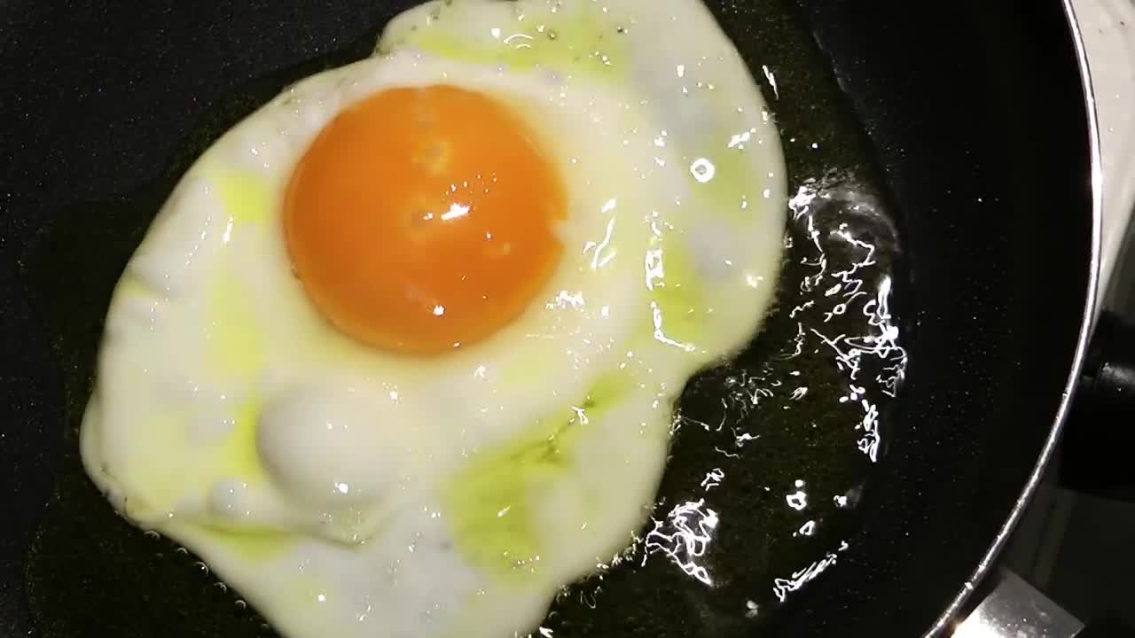 Download Stock Video Frying A Crashed Egg In A Frying Pan Live Wallpaper For PC