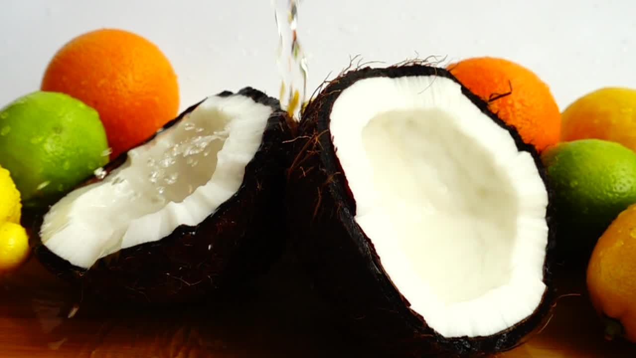 Download Stock Video Fruit Composition With A Coconut In The Foreground Live Wallpaper For PC