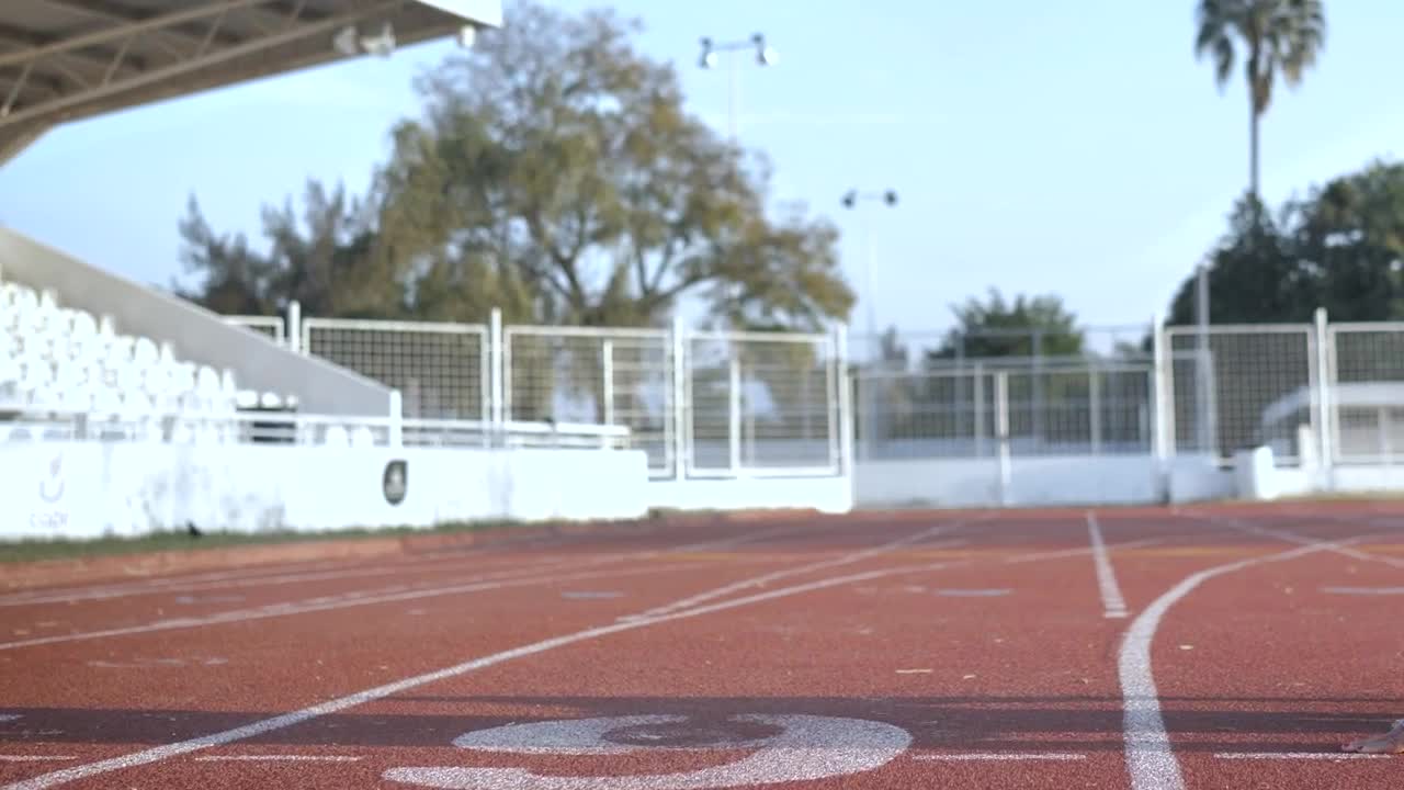 Download Stock Video Front View Of A Female Runner In The Start Position Live Wallpaper For PC