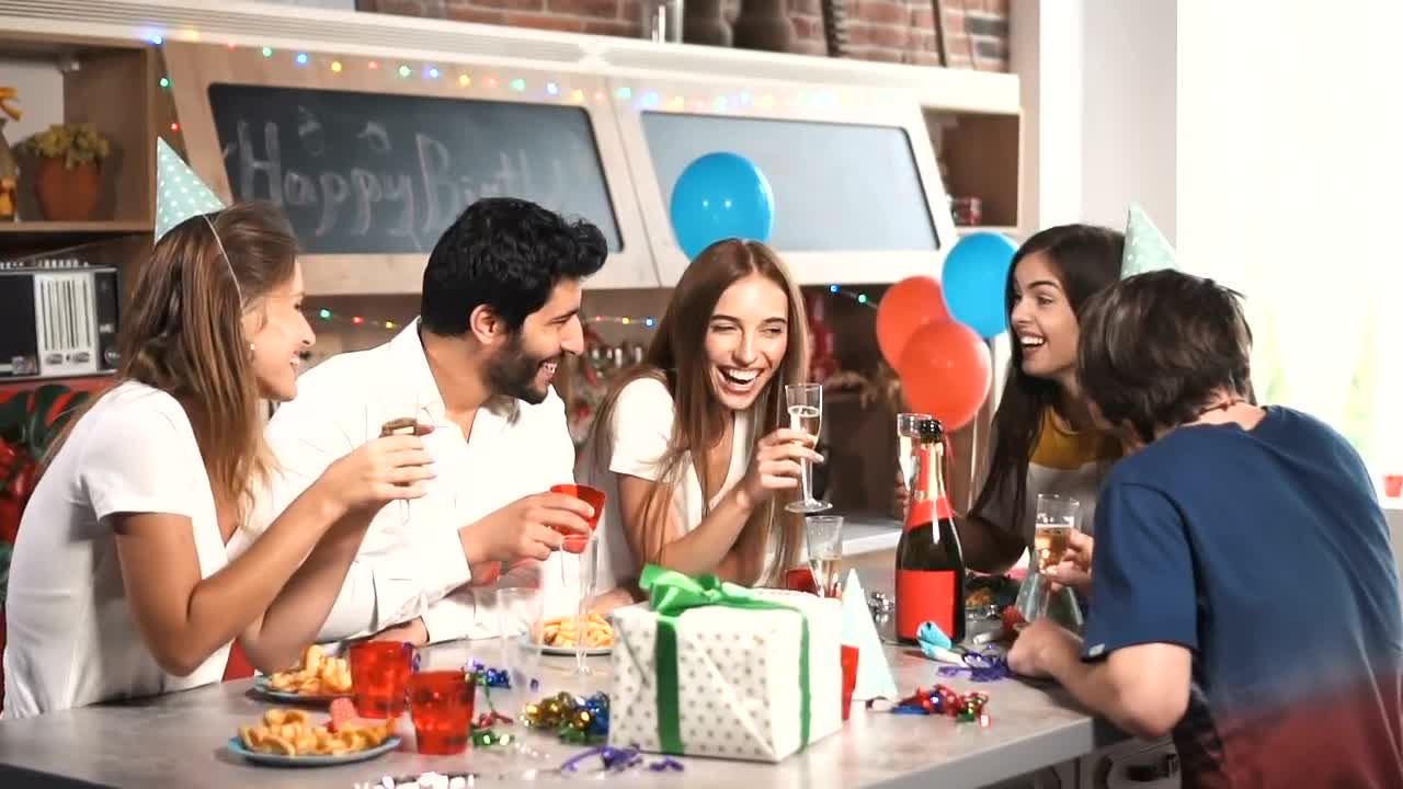 Download Stock Video Friends Laugh Over Champaign At Birthday Party Live Wallpaper For PC