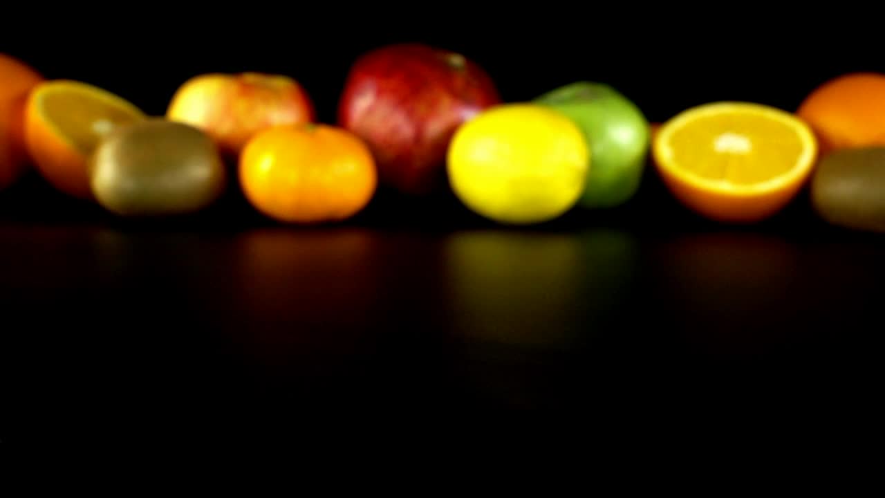 Download Stock Video Kiwi Halved Close To More Fruit Animated Wallpaper