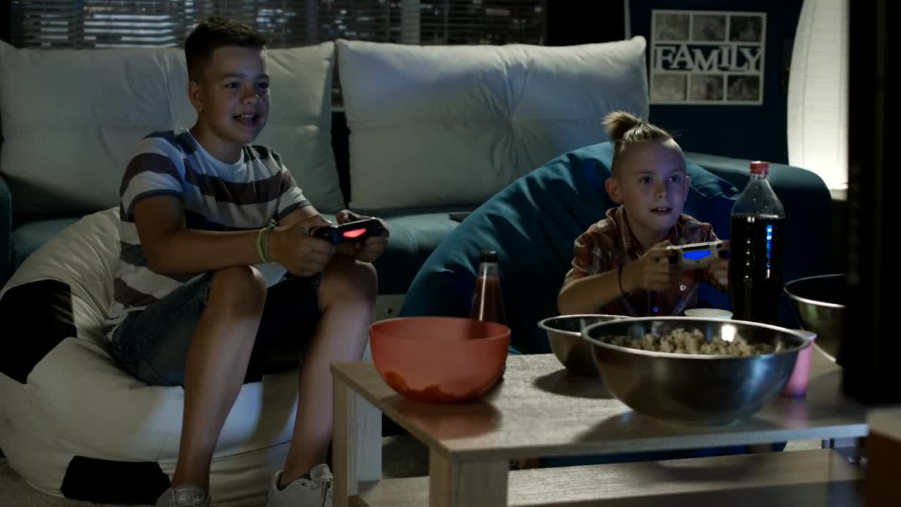 Download Stock Video Kids Playing Video Games In The Living Room Animated Wallpaper