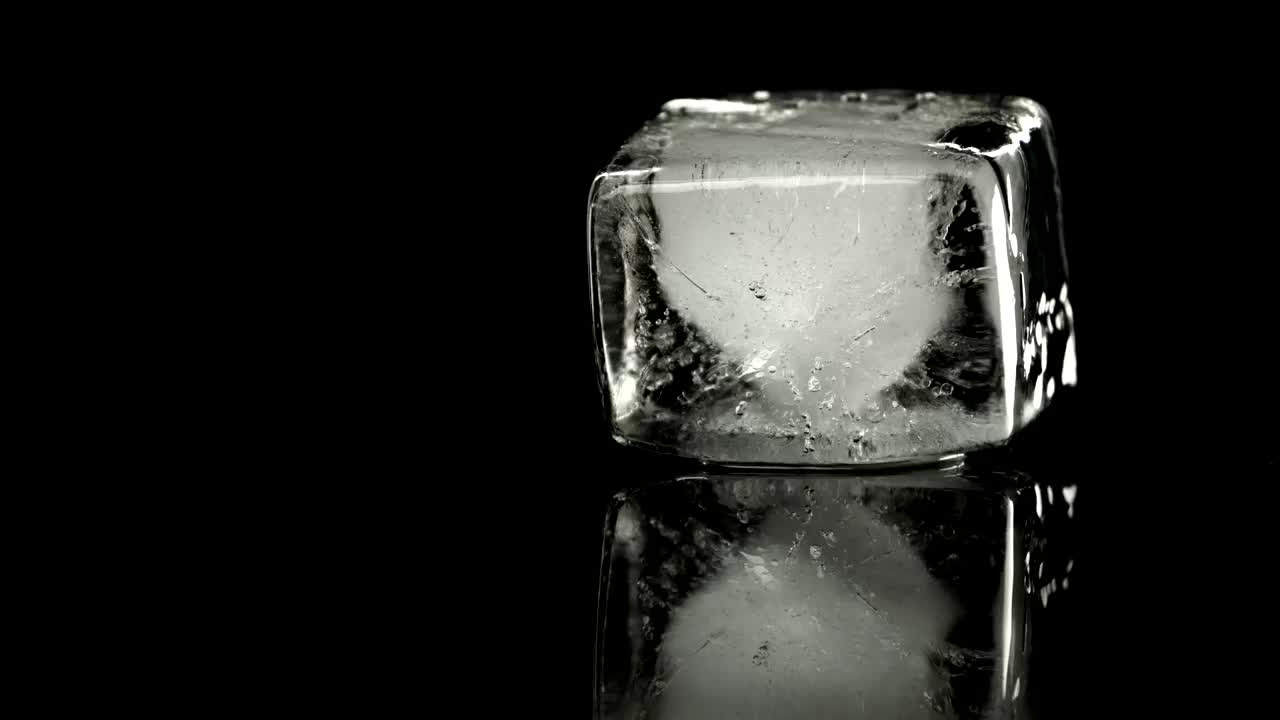 Download Stock Video Ice Cube Melting Animated Wallpaper