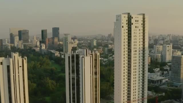 Download Stock Video Huge City With A Large Park In An Aerial Shot Smal Animated Wallpaper