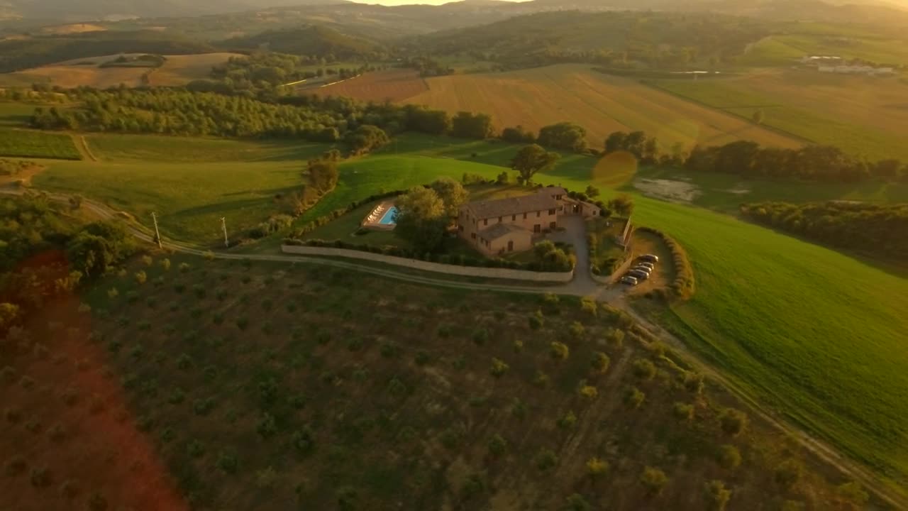 Download Stock Video House In The Countryside Seen From The Air Animated Wallpaper