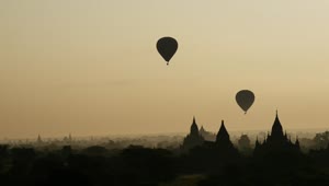 Download Stock Video Hot Air Balloons Flying During Sunrise Animated Wallpaper