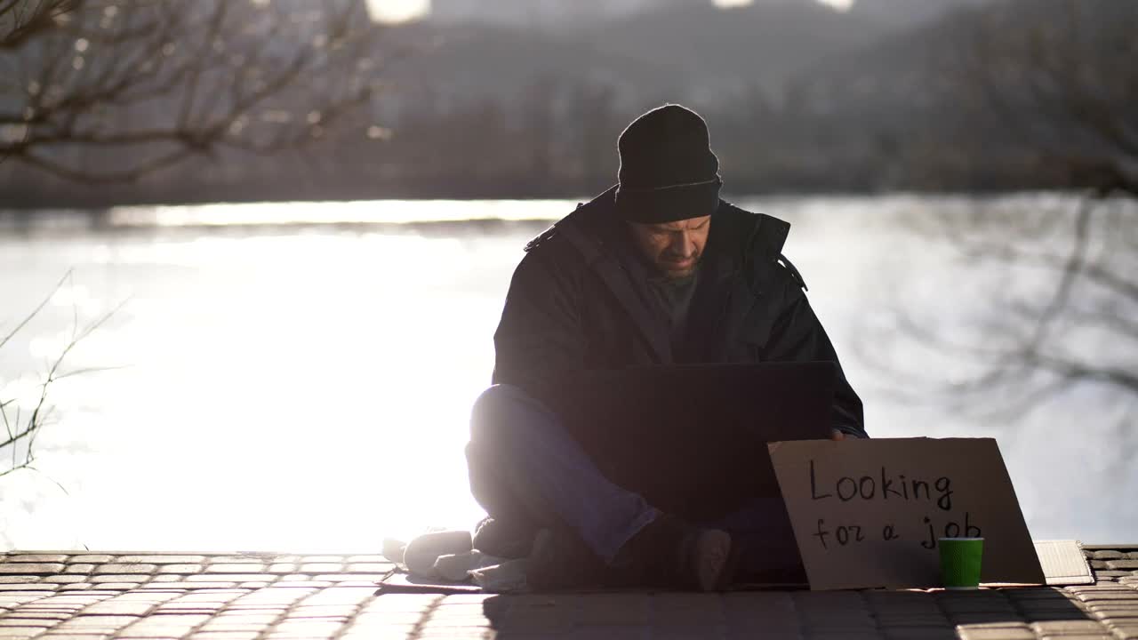 Download Stock Video Homeless Man Asking For Work Animated Wallpaper