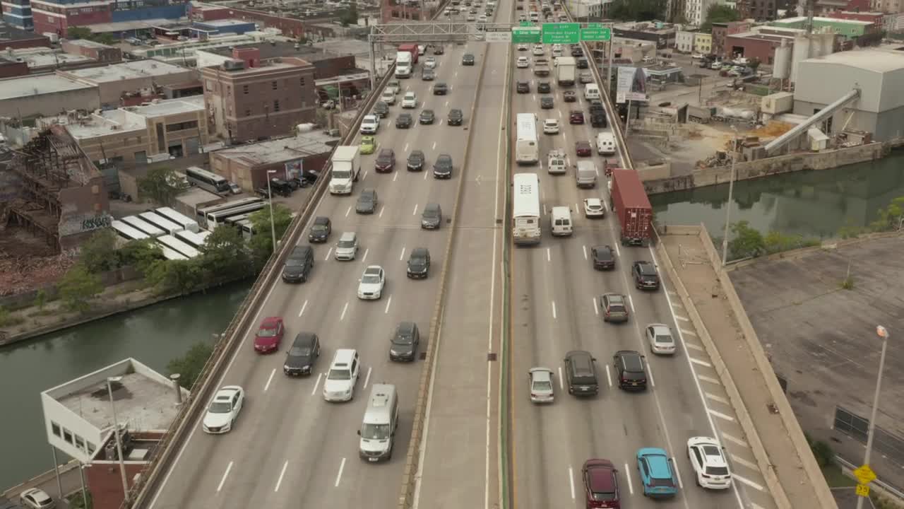 Download Stock Video Highway Near A Metropolis From Above Animated Wallpaper