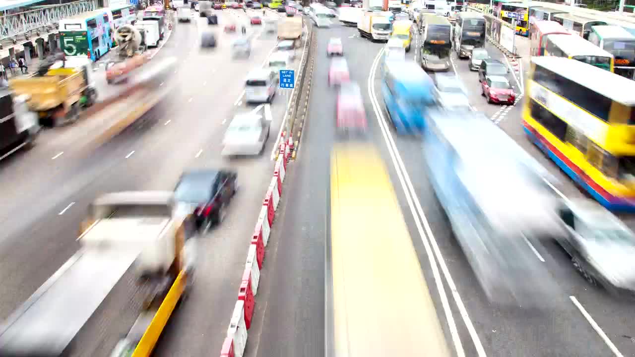 Download Stock Video Heavy Traffic On A Busy Avenue In Hong Kong Animated Wallpaper