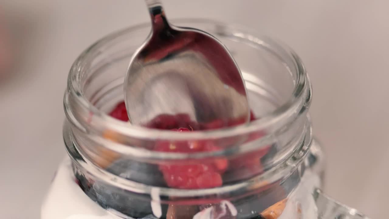 Download Stock Video Healthy Yogurt With Berries Animated Wallpaper