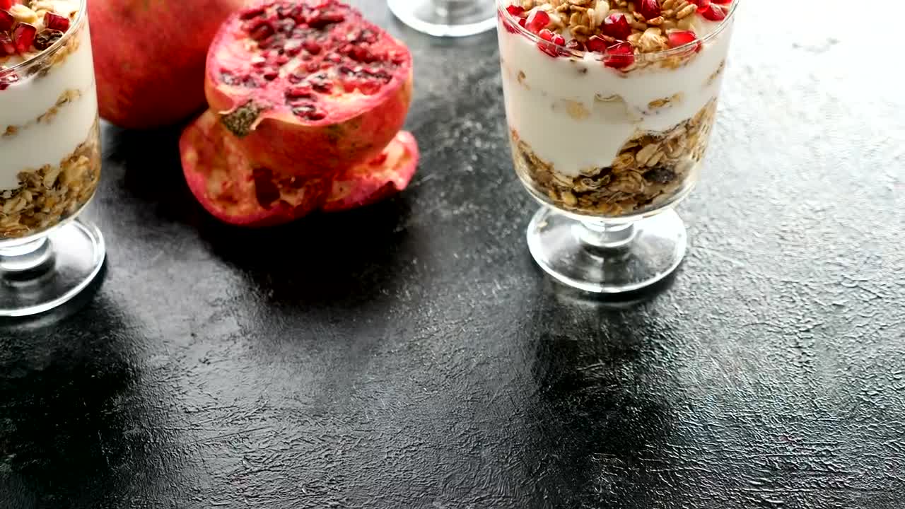 Download Stock Video Healthy Foods Diet Yogurt And Muesli With Pomegranates Animated Wallpaper