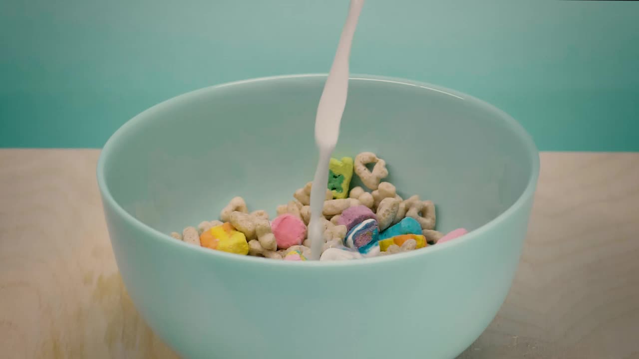 Download Stock Video Healthy Cereal In A Bowl While Pouring Milk Animated Wallpaper