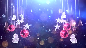 Download Stock Video Hanging Christmas Balls And Ornaments While Snowing Animated Wallpaper