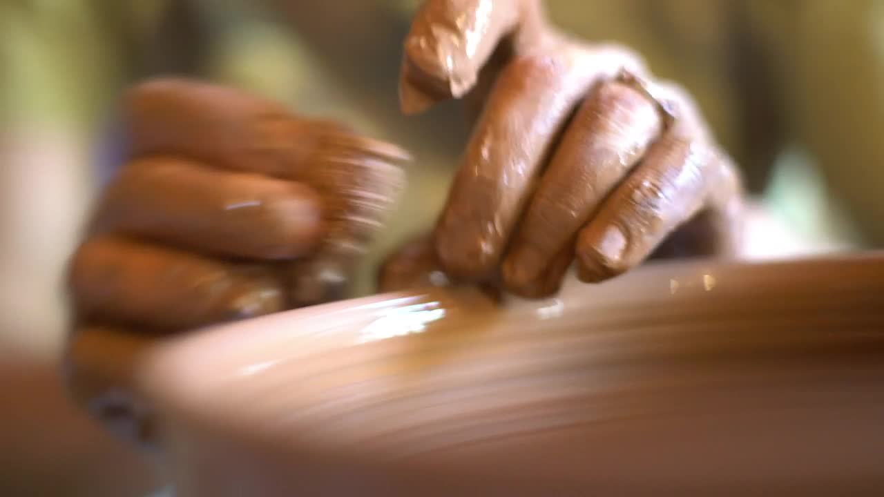 Download Stock Video Hands Working On Pottery Animated Wallpaper