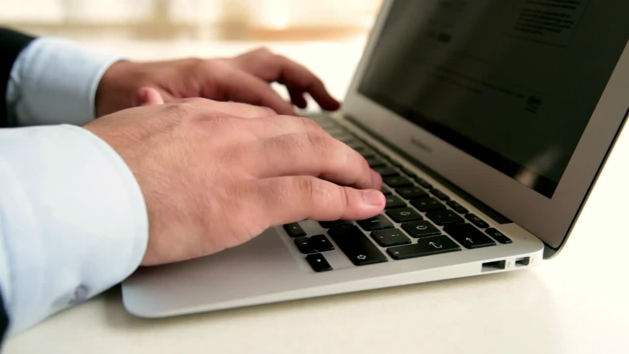 Download Stock Video Hands Of A Person Typing On A Computer Animated Wallpaper