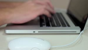 Download Stock Video Hands Of A Man Using A Laptop Deftly Animated Wallpaper