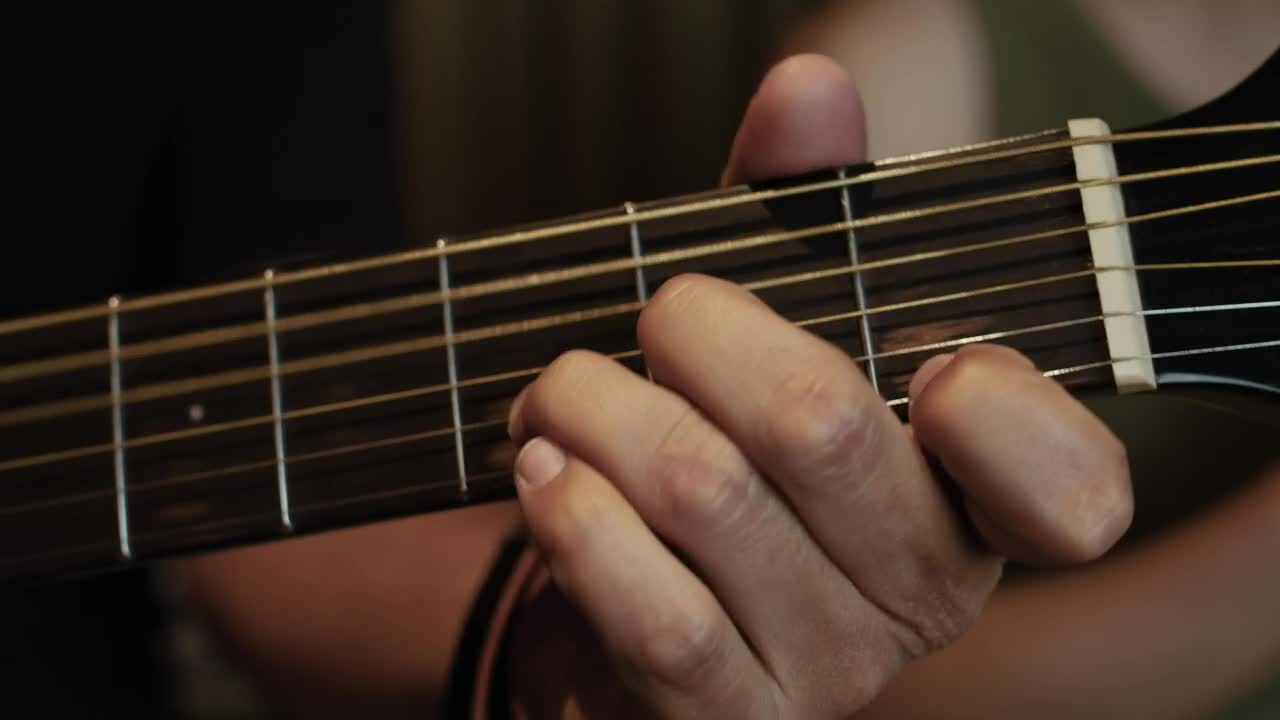 Download Stock Video Hands Of A Guitarist Changing Chords Animated Wallpaper