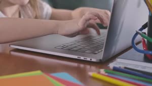 Download Stock Video Hands Of A Girl Typing A Laptop Animated Wallpaper