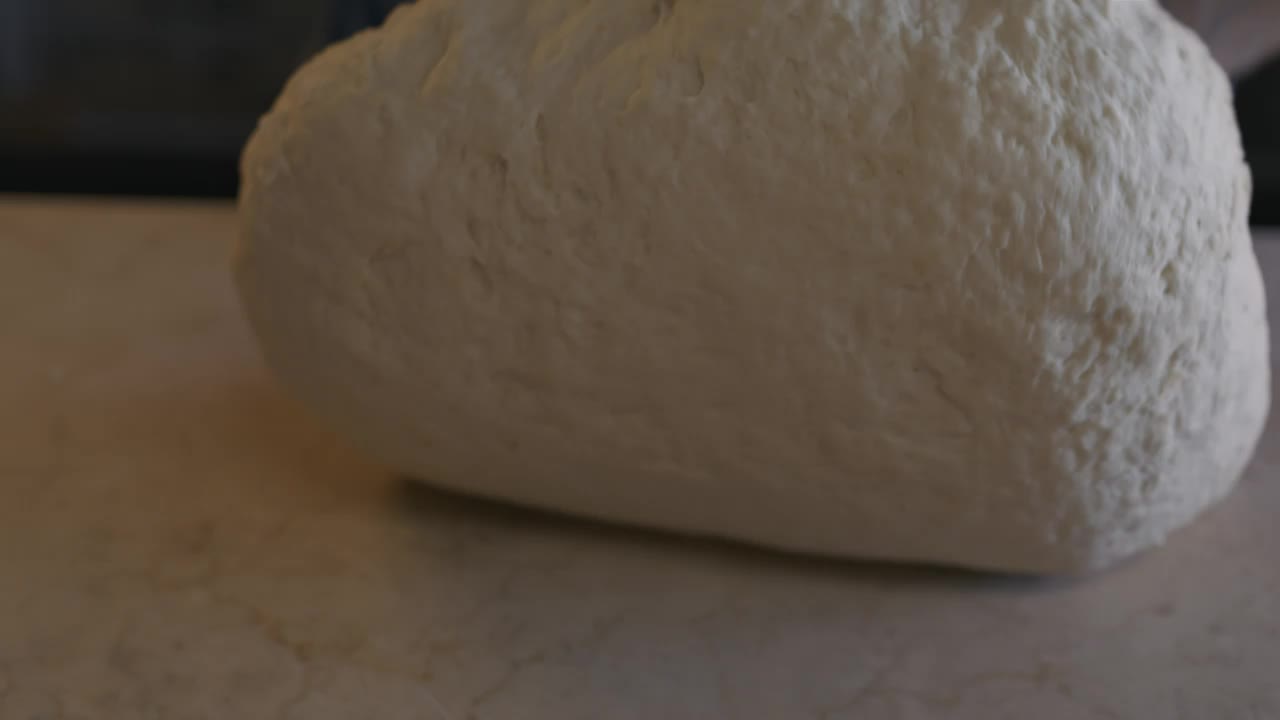 Download Stock Video Hands Of A Baker Kneading A Dough Animated Wallpaper