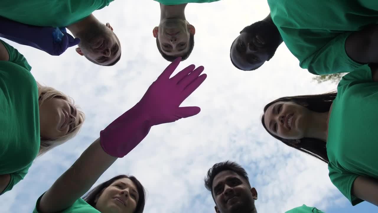 Download Stock Video Hands In The Middle Of A Work Team Animated Wallpaper