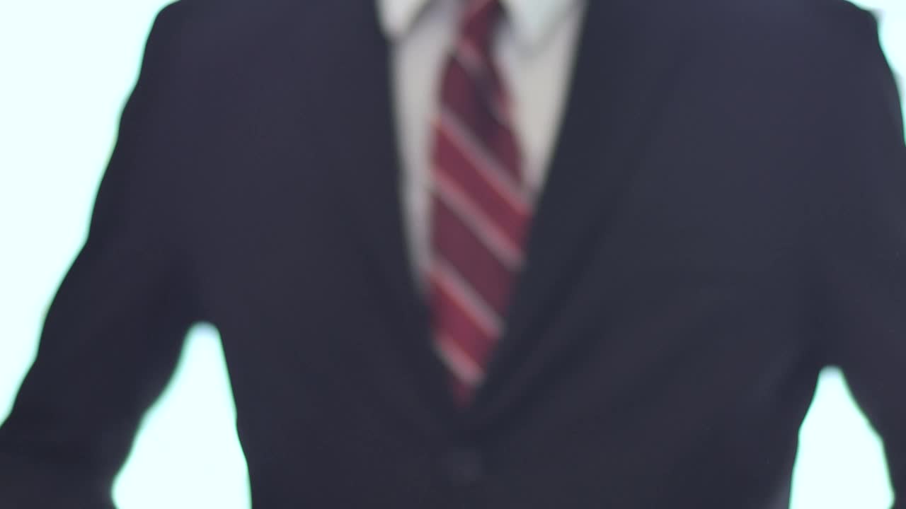 Download Stock Video Hands In A Handshake With A Person In A Suit Animated Wallpaper