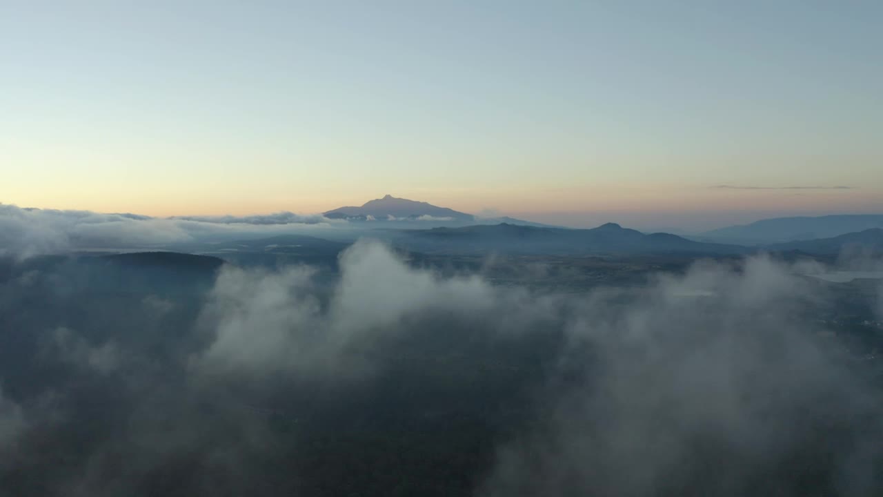 Download Stock Video Landscape From The Top Of A Cloudy Mountain Range Animated Wallpaper