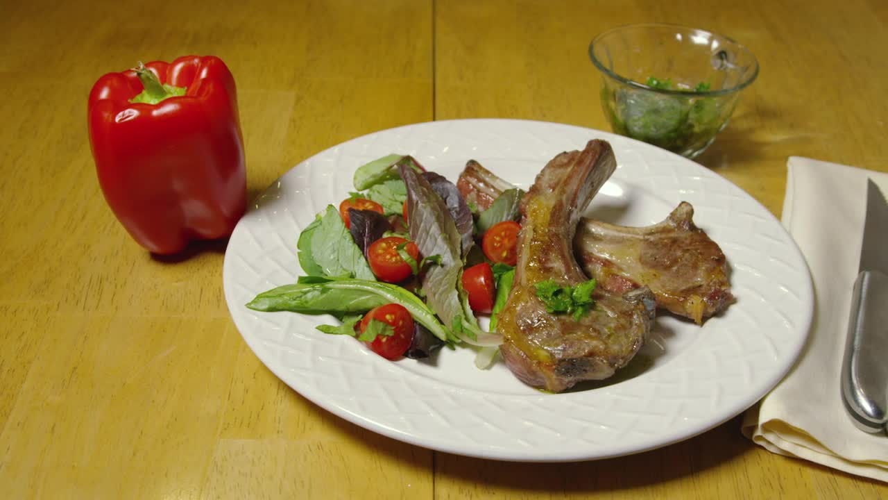 Download Stock Video Lamb With Salad And Herbs Animated Wallpaper