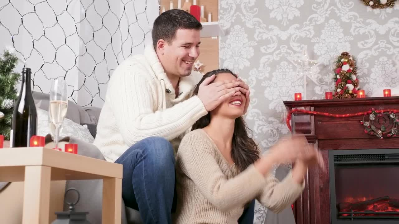 Download Stock Video Man Giving His Wife A Surprise Animated Wallpaper