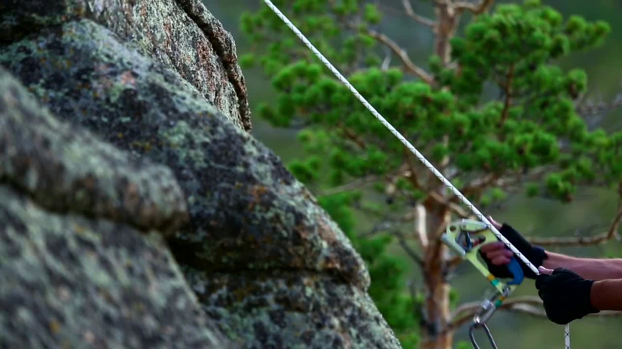 Download Stock Video Man Climbing A Rock Animated Wallpaper