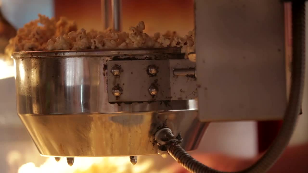 Download Stock Video Making Popcorn In A Machine Animated Wallpaper