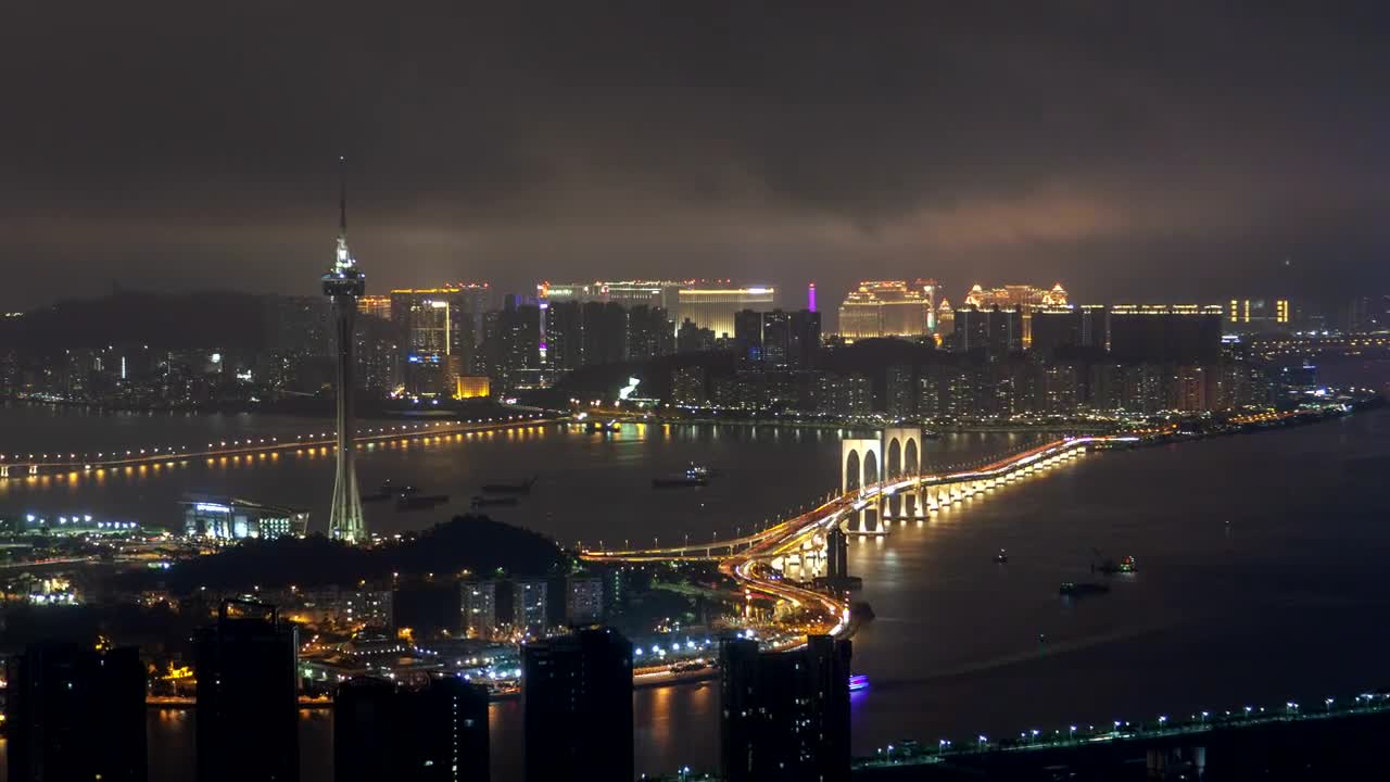 Download Stock Video Macau Tower And Bridge Traffic At Night Animated Wallpaper