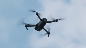 Download Stock Video Low View Of A Drone Flying Against The Sky Animated Wallpaper