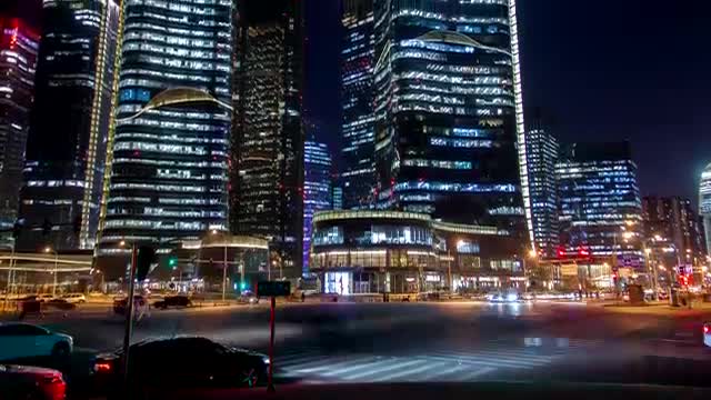 Download Stock Video Looking Up At Large Buildings In A City At Night Smal Animated Wallpaper