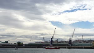 Download Stock Video Looking Across A Port On A Cloudy Day Animated Wallpaper
