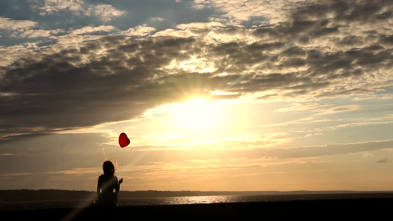 Download Stock Video Lonely Woman Alone With A Balloon Animated Wallpaper