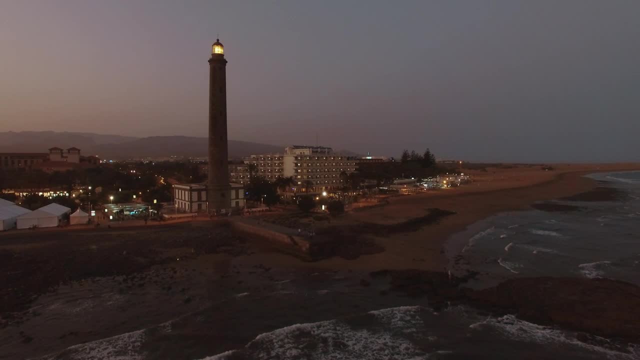 Download Stock Video Lighthouse And A Hotel At Dusk Animated Wallpaper