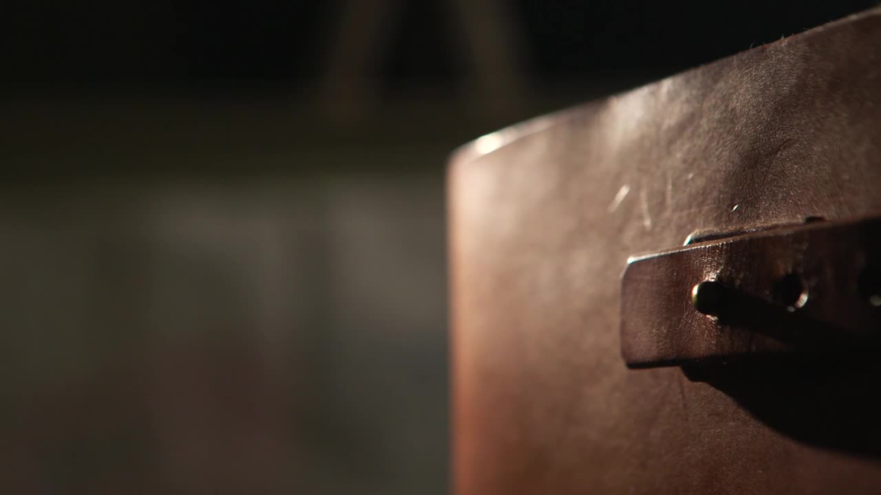 Download Stock Video Leather Covered Book Animated Wallpaper