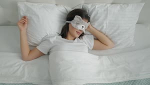 Download Stock Video Lazy Girl In Animal Mask Sleeps Through Alarm Animated Wallpaper