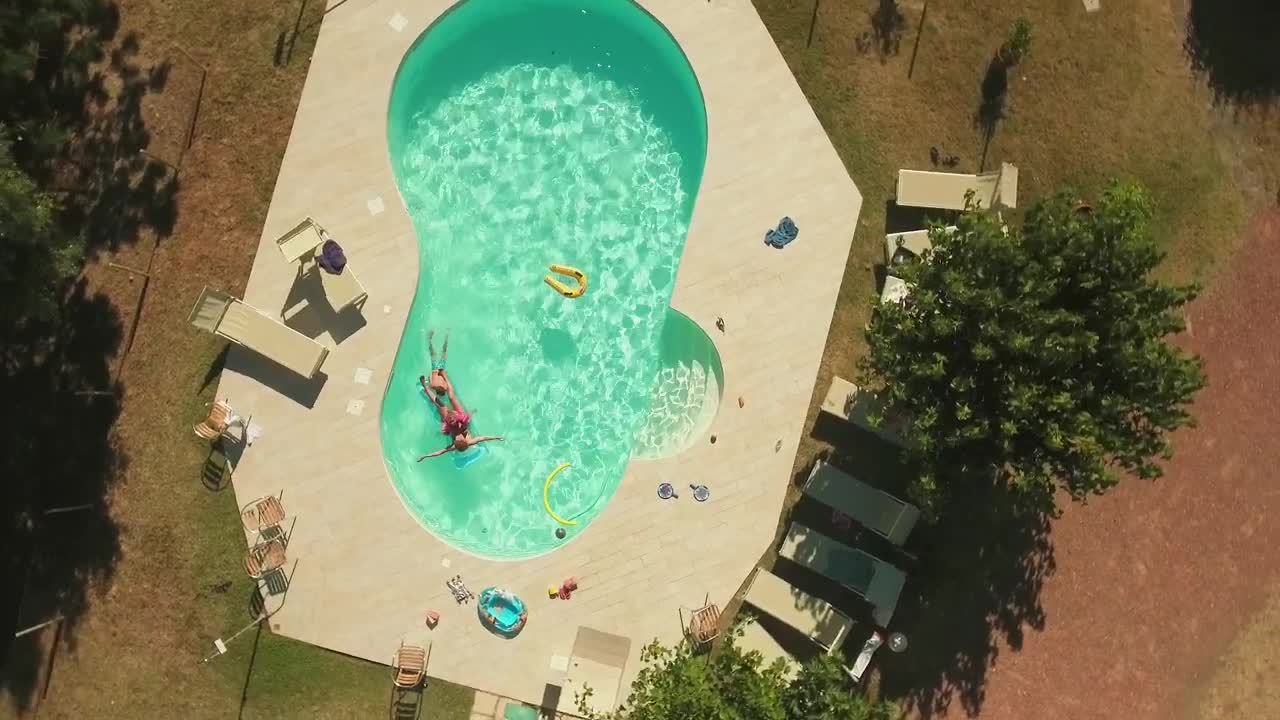 Download Stock Video Laying In A Pool Animated Wallpaper