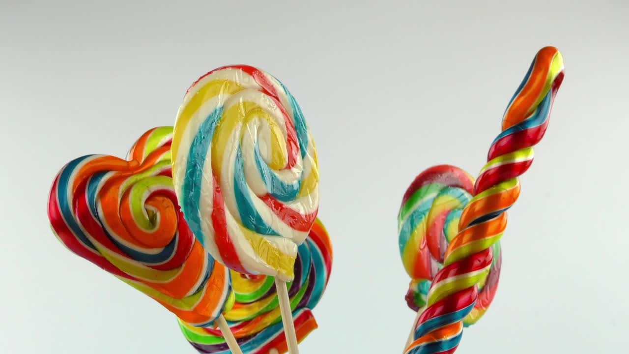 Download Stock Video Large Rainbow Swirl Lollipops Animated Wallpaper