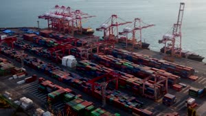 Download Stock Video Large Container Area On A Cargo Ship Shoreline Aerial View Animated Wallpaper