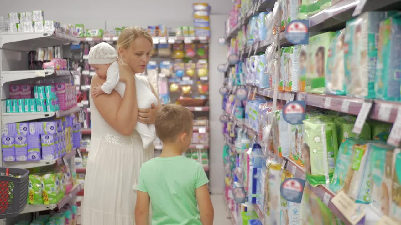 Download Stock Video Mother Browsing Diaper Animated Wallpaper